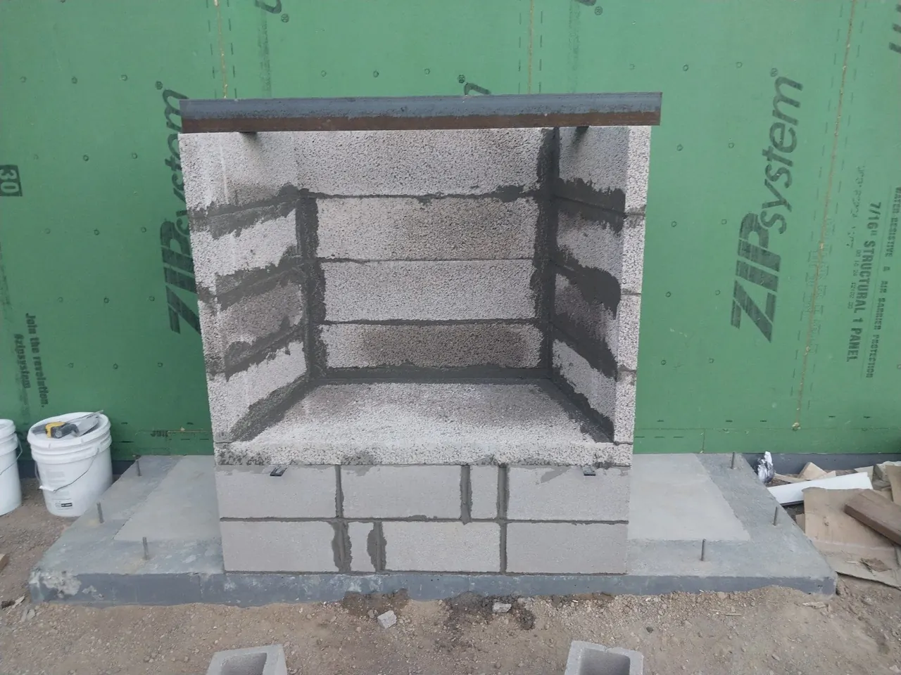 Block fireplace structure before finish masonry
