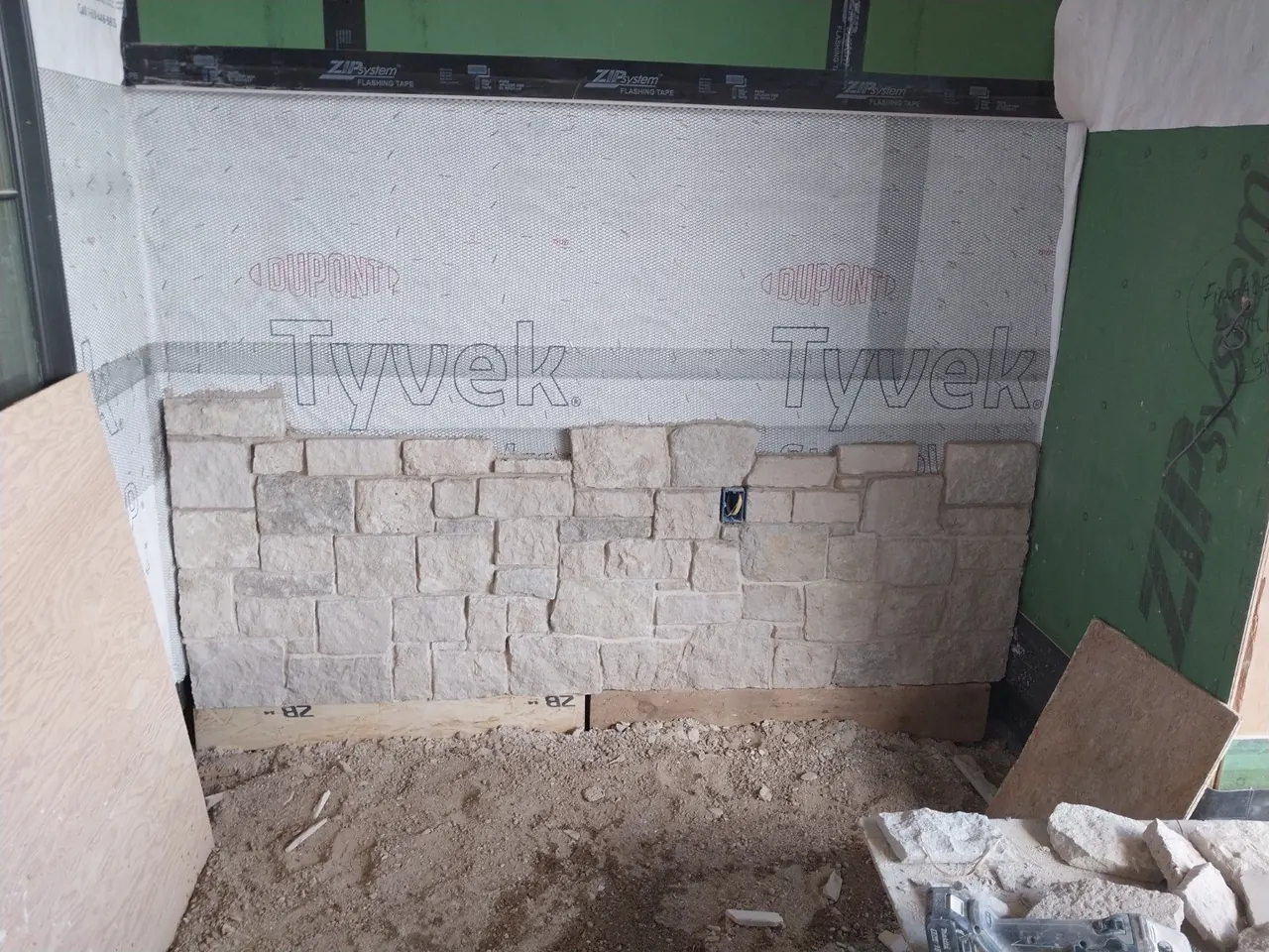 Stone veneer installation in progress